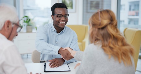 Image showing Senior couple, insurance agent and handshake with planning and investment at meeting. Finance, shaking hands and agreement deal for accounting and retirement budget for income savings with thank you