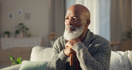 Image showing Home, thinking and old man with depression, memory and remember with retirement, alone and sad. Male person, elderly guy or pensioner in a living room, depressed and mental health issue with thoughts