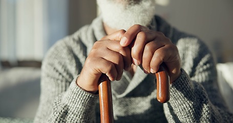 Image showing Closeup, senior and hands of man with cane for support, walking help and aging. Morning, house and elderly person with gear for a walk on the living room sofa for healthcare and holding for strength