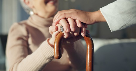 Image showing Support, cane and hands of senior woman with a walking stick for help, support and old age caregiver care for patient. Healthcare, empathy and elderly person in a nursing home for medical health