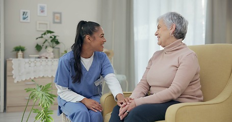 Image showing Holding hands, support and happy with nurse with old woman on sofa for empathy, medical and trust. Healthcare, retirement and rehabilitation with patient and caregiver in nursing home for healing