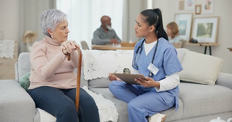 Image showing Healthcare, consultation and nurse with senior woman in the living room of the retirement home. Medical, checkup and female caregiver speaking to elderly patient with walking cane in nursing facility