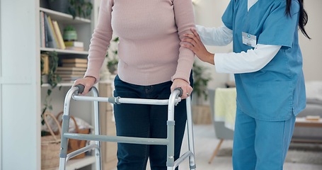 Image showing Caregiver, hands or elderly woman walking with walker for support, geriatric senior care or old age movement disability. Retirement nursing home, disabled or closeup nurse helping patient with moving