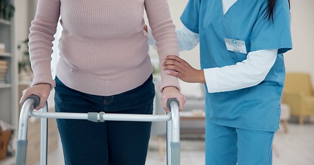 Image showing Nurse, hands or senior woman walking with walker for support, elderly care or old age movement disability. Retirement home volunteer, charity or closeup caregiver helping patient with disabled moving