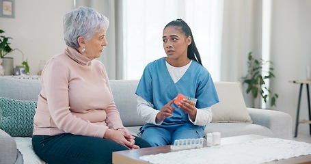 Image showing Container, senior woman or nurse explain medication instruction, medicine or pharmaceutical prescription. Conversation, home medical advice or retirement caregiver talk to elderly patient about pills