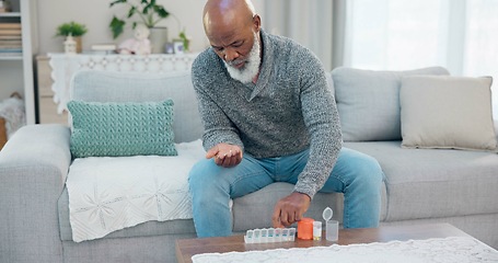 Image showing Container, senior black man and organise pills tablet, health medication or pharmaceutical prescription. Home sofa, medical supplement drugs and African elderly person set daily healthcare medicine