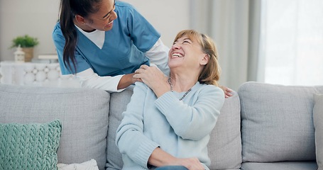 Image showing Caregiver, conversation and elderly woman laughing at funny joke, senior care humour or health service comedy. Retirement home, healthcare comic and nurse talking to relax patient, laugh and bond