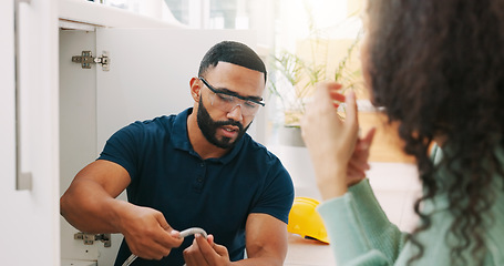 Image showing Plumber black man, woman and maintenance talk in kitchen for sink pipe with customer support in home. Entrepreneur handyman, plumbing or small business owner with consulting for fixing water system