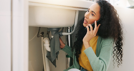 Image showing Sink leak, plumbing and woman on a phone call for maintenance, plumber service and home construction. Communication, manual labour and stressed girl calling handyman for faucet, pipes or kitchen leak