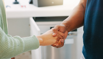 Image showing Handshake, kitchen and closeup with man, woman and agreement for plumbing services in home. Shaking hands, plumber and client with thank you for maintenance, repair and consulting in house for job