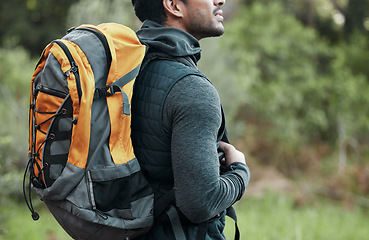 Image showing Man, backpack and closeup with view, thinking and camping travel in the forest for holiday. Exercise, trekking workout and hiking in the woods for vacation with freedom in nature on a journey