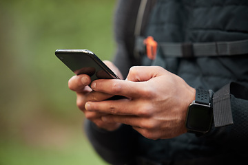 Image showing Closeup, man or athlete with a smartphone, typing or social media with mobile user, tracking progress or contact. Person, runner or hands with digital app, cellphone or break with exercise or network