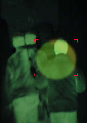 Image showing Military, enemy and target in night vision, overlay or dark green silhouette of spy, agent or terrorist risk to soldier. Police, surveillance and security people in infrared scope for army mission