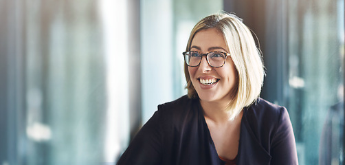 Image showing Face, smile and mockup with a designer woman in a creative, professional or modern workplace. Vision, thinking and space with a happy young design employee in her office boardroom for planning