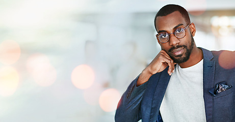 Image showing Portrait, business and black man in glasses at office on bokeh mockup space. Face, professional and confident African entrepreneur, consultant and employee worker in company workplace in Nigeria.