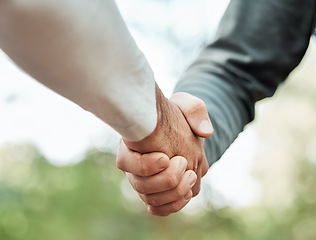 Image showing Closeup, people and shaking hands outdoor for meeting, introduction or hello in support, success or team. Handshake, thank you or collaboration of friends in community for solidarity, respect or deal