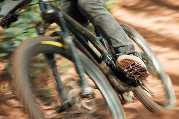 Image showing Feet, mountain bike pedal and speed in forest, closeup and training for health, wellness and outdoor adventure. Person, cycling and bicycle with fast race, exercise and workout with balance off road