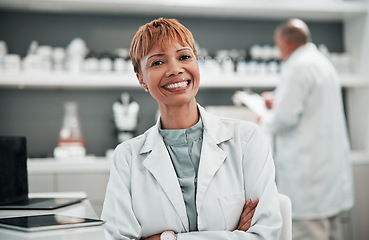 Image showing Portrait, science and arms crossed with a woman doctor in the laboratory for research, innovation or breakthrough. Medical, study and smile with a mature scientist working in a pharmaceutical lab