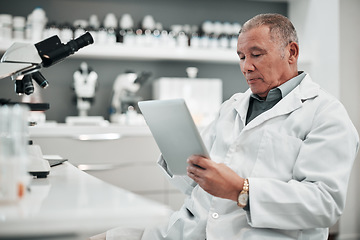 Image showing Reading, research and scientist in lab with tablet, tech and planning for healthcare, medicine and pharmaceutical study. Online, search and man in science laboratory with analysis of data or report