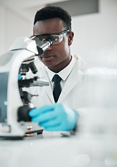 Image showing Microscope, black man and analytics with research, medical and experiment for vaccine, test or sample. African person, scientist or researcher with lab equipment, pathology or biotechnology with cure