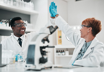 Image showing Scientist man, woman and high five in lab, smile or partnership with goals, results or innovation in workplace. African science expert, teamwork and congratulations for success with medical research