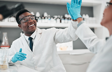Image showing Scientist man, woman and high five in laboratory, smile or partnership for goals, results or innovation with ppe. African science expert, teamwork and congratulations for success in medical research