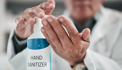 Image showing Doctor, hands and press sanitizer bottle for cleaning, risk or protocol of hygiene in hospital, clinic and surgery. Closeup, healthcare and disinfection liquid for safety, flu germs or virus bacteria