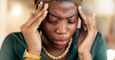 Image showing Headache, stress and burnout with a business black woman suffering from tension while working in her office. Anxiety, mental health and pain with a female employee rubbing her temples in discomfort