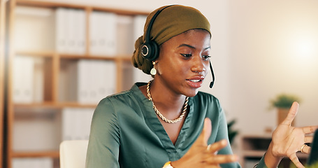 Image showing Telemarketing, customer service and black woman speaking, call center and agent in workplace. African American female employee, consultant and worker with headset, tech support and explain new system