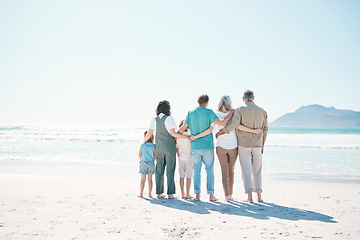 Image showing Back, beach and family with love, hug and summer vacation with bonding, support and travel. Grandparents, mother and father with children, embrace or seaside holiday with care, ocean and mockup space