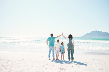 Image showing Family, beach and summer vacation on mockup in travel, outdoor holiday or together on sunny day. Rear view of father, mother and children on ocean coast for fun day, bonding or break at sea in nature