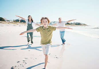 Image showing Running, freedom and happy with family on beach for energy, travel and summer vacation. Love, relax and adventure with people playing on seaside holiday for health, bonding and games together