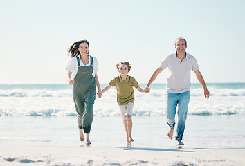 Image showing Running, happy and holding hands with family on the beach for support, summer vacation or bonding. Freedom, health and love with people on seaside holiday for adventure, trust and travel together