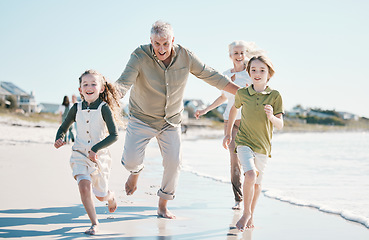 Image showing Running, happy and grandparents with children on beach for energy, freedom and summer vacation. Love, relax and travel adventure with family on seaside holiday for health, bonding and games together