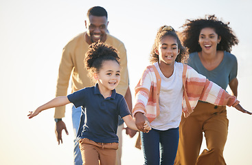 Image showing Nature freedom, sky and happy family running, fun race and play games, chase children and connect. Siblings, speed and fast kids holding hands, energy and bonding mother, father or parents together