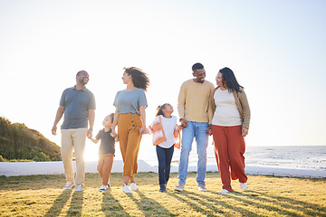 Image showing Nature field, walking and happy family holding hands, bonding and connect with countryside holiday, wellness and love. Summer, freedom and relax children, mother and father support, care and journey