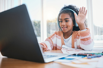 Image showing Laptop, headphones and child on video call for elearning lesson for education or knowledge. Home school, technology and girl kid student wave for hello on virtual class on computer at her house.