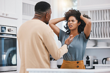 Image showing Stress, divorce and couple fighting in a kitchen with anxiety, debt or erectile dysfunction at home. Marriage, doubt and man with woman in a house for conflict, argue or liar, cheating or infertility