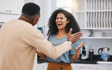 Image showing Divorce, stress and angry couple screaming in a kitchen for debt, mistake or commitment doubt at home. Marriage, conflict and man with woman in house for infertility, anxiety or erectile dysfunction