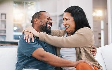 Image showing Happy, hug and mature couple on sofa in living room for bonding, healthy relationship and marriage. Love, home and happy black man and woman embrace on couch for relaxing, happiness and commitment