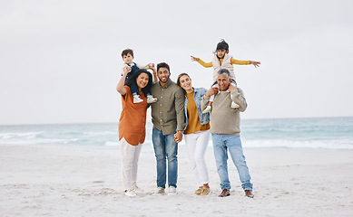 Image showing Big family, portrait and happy vacation on beach with children, parents and grandparents together with peace and freedom. Rio de janeiro, holiday and people with love, support and happiness in nature