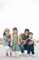 Image showing Happy family, portrait and children with parents on beach, vacation or travel to Rio de Janeiro with happiness or freedom. Face, smile and young kids with mom and dad in summer, holiday or mockup