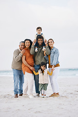 Image showing Big family, portrait and happy vacation on beach with children, parents and grandparents together with peace and freedom. Rio de janeiro, holiday and people with love, support and happiness in nature