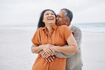 Image showing Beach, hug and senior couple laugh at funny conversation, nature joke or travel holiday humour. Tropical date, comedy and romantic elderly man, old woman or marriage people bonding, hugging and care