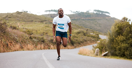 Image showing Fitness, running and and man in a road for marathon, sports and training, morning or cardio routine. Runner, workout and African male athlete in street with energy, exercise or resilience performance