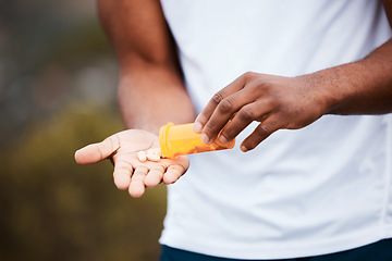 Image showing Health, hands and person with supplements for fitness and energy, pills and vitamins with pharmacy and outdoor. Athlete, performance enhancement drugs and wellness, healthcare and pharmaceutical