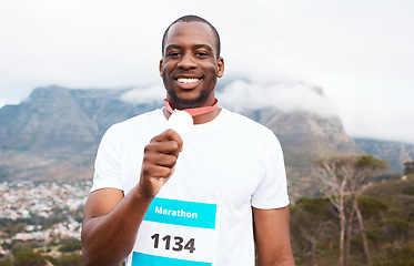 Image showing Runner man, winner and medal in portrait for marathon, competition or race with smile in Cape Town. African athlete guy, champion and success in challenge, contest and happy for metal prize in nature