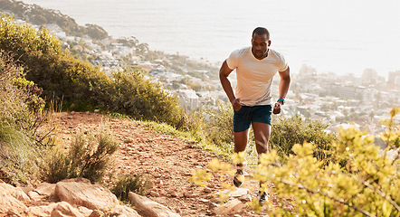 Image showing Fitness, hill or runner running on mountain by nature for exercise, training or outdoor workout. Sports race, fast black man or healthy active athlete on trail with endurance, freedom or challenge