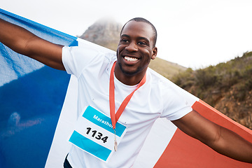 Image showing Winner, flag or happy black man, runner and marathon victory of challenge, sports competition or cardio event. Success, country patriot or France athlete running with pride, gold medal or prize award