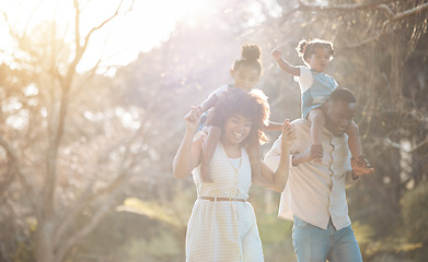 Image showing Parents with kids in park, piggy back and walking for love, bonding or peace in nature together. Mother, father and children on shoulders in garden, black family on summer weekend in woods or forrest